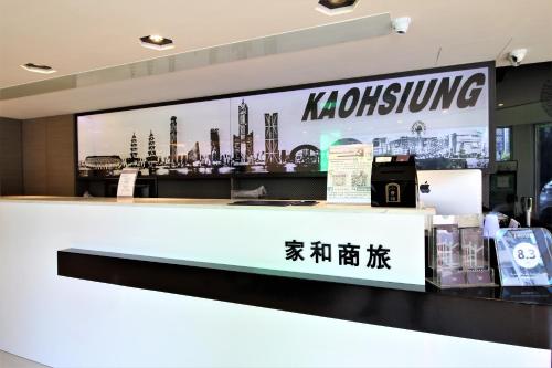 a kochine store with a sign on the counter at J-HOTEL in Kaohsiung