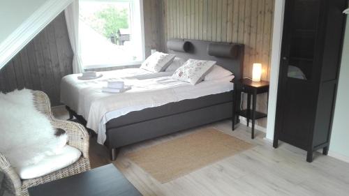 Tempat tidur dalam kamar di Voss- Myrkdalen Lodge