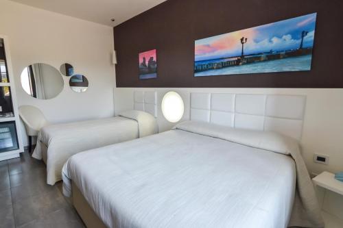Ένα ή περισσότερα κρεβάτια σε δωμάτιο στο Motel S.16