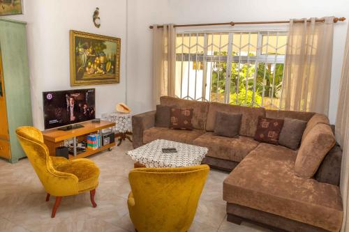 Zona de estar de The Orchard Holiday Home