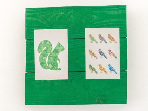 a group of three cards with a lizard on them at Downtown Forest Hostel & Camping in Vilnius