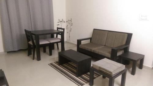 Posezení v ubytování Tranquil Serviced Apartments