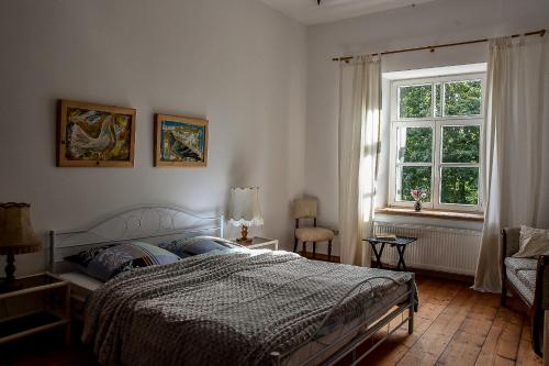 Postel nebo postele na pokoji v ubytování Maras Manor