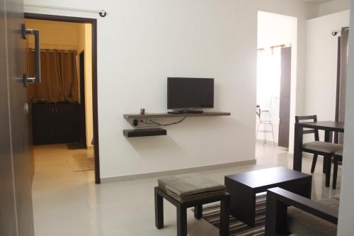 TV a/nebo společenská místnost v ubytování Tranquil Serviced Apartments