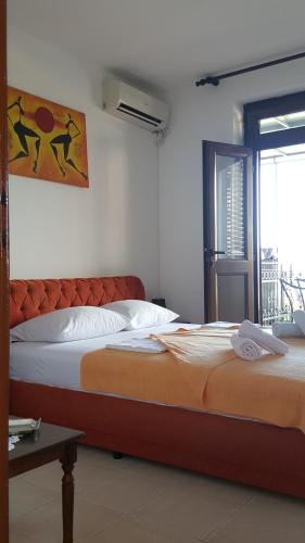 Postel nebo postele na pokoji v ubytování Guest House Ivo Jovanovic