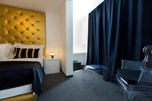 Postel nebo postele na pokoji v ubytování B Gold Luxury rooms B&B
