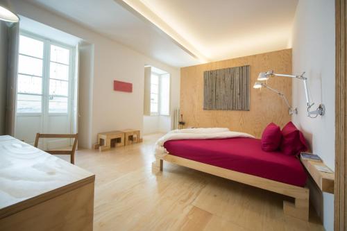 Ένα ή περισσότερα κρεβάτια σε δωμάτιο στο winebnb