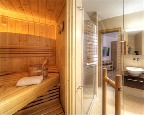 Postel nebo postele na pokoji v ubytování Residenz Ambassador B11