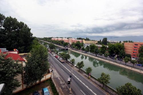 a view of a river in a city at Ambiance Hotel in Bucharest
