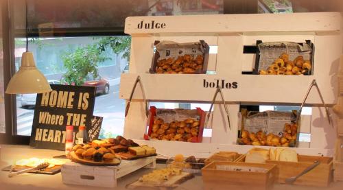 a store display with lots of different types of food at Vincci Soma in Madrid