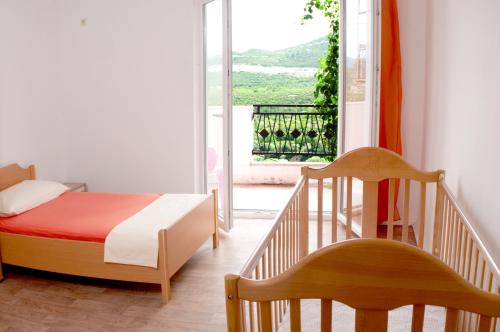 Postel nebo postele na pokoji v ubytování Apartment Kraljević