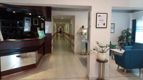 The lobby or reception area at Siesta Club Hotel
