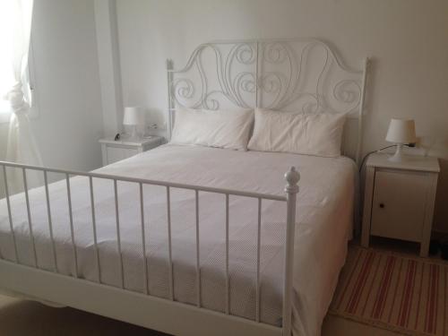 En eller flere senge i et værelse på Residencial Zahazar