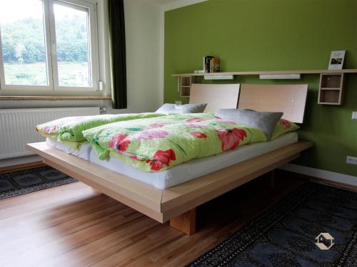 Haus Michler tesisinde bir odada yatak veya yataklar