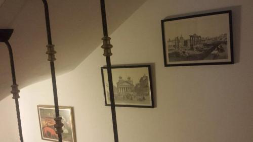 a room with two pictures on the wall at Villa Lollobrigida in Ohrid