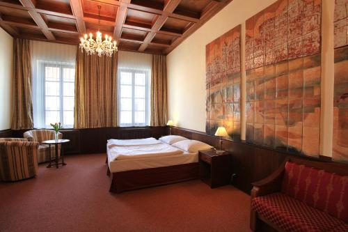 Posteľ alebo postele v izbe v ubytovaní Hotel Zlatá hvězda
