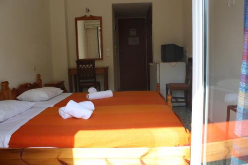 Postel nebo postele na pokoji v ubytování Hotel Elektra