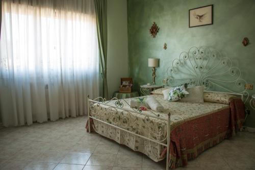 Voodi või voodid majutusasutuse Luca's home in Tuscany toas