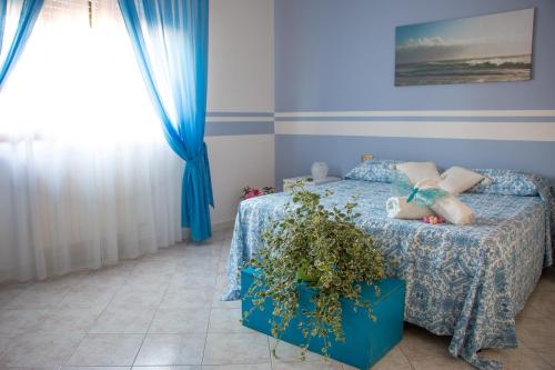 Una cama o camas en una habitación de Luca's home in Tuscany
