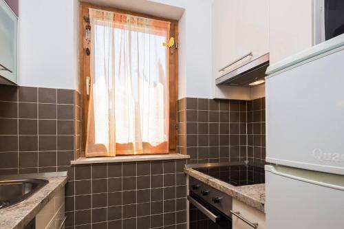 Kuchyňa alebo kuchynka v ubytovaní Apartments Judita