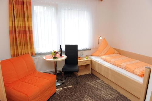 Postel nebo postele na pokoji v ubytování Hotel Zum Birkenhof