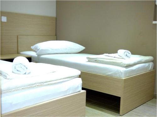 Postel nebo postele na pokoji v ubytování Apartments Dalmacija Tučepi