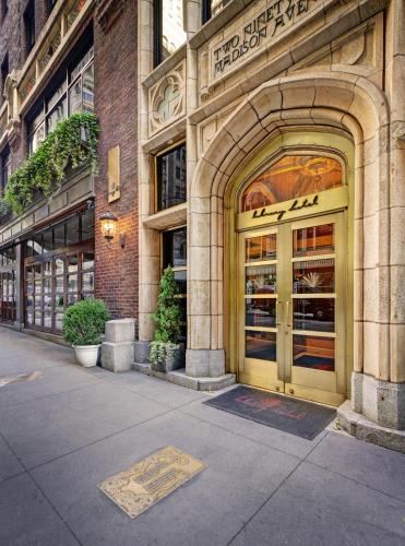 a building with an entrance to a store at Library Hotel by Library Hotel Collection in New York