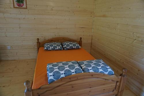 Postel nebo postele na pokoji v ubytování Pie Andra Pitragā