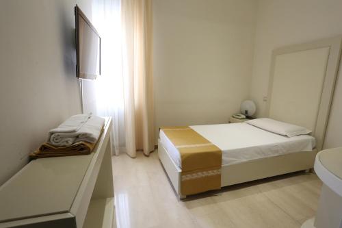 Katil atau katil-katil dalam bilik di Hotel Europa