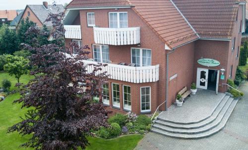 an aerial view of a red brick house at Landgasthaus Fischer in Bad Nenndorf