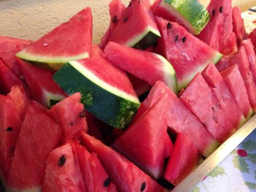 a pile of red watermelon slices on a plate at Hotel Viking in Rimini