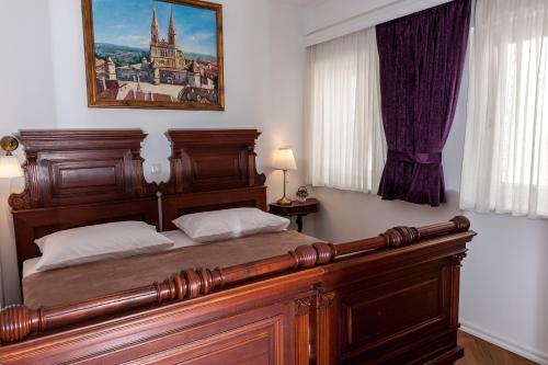 Postel nebo postele na pokoji v ubytování Main Square penthouse