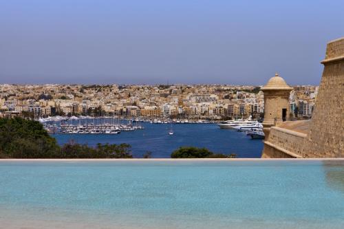 a view of a harbor with boats in the water at The Phoenicia Malta - The Leading Hotels of the World in Valletta