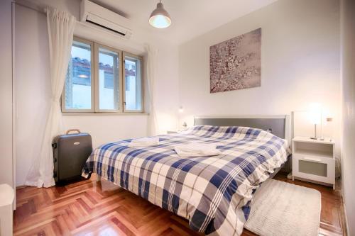 A bed or beds in a room at Bellevue Apartment Hvar