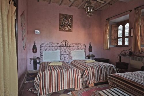 Cama o camas de una habitación en Sawadi Ecolodge