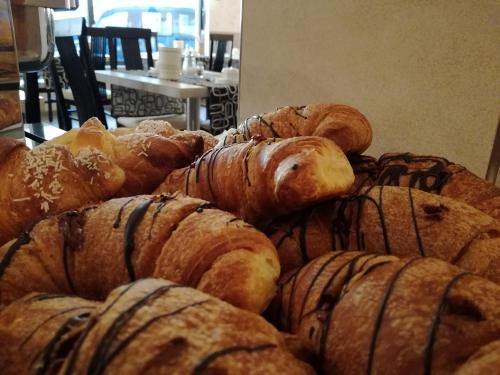 a pile of pastries sitting on top of a table at Hotel Nevada in Bibione