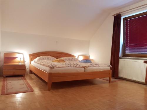 Postel nebo postele na pokoji v ubytování Apartmaji Mežan