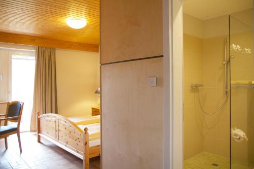 Cama ou camas em um quarto em Biohotel Spöktal