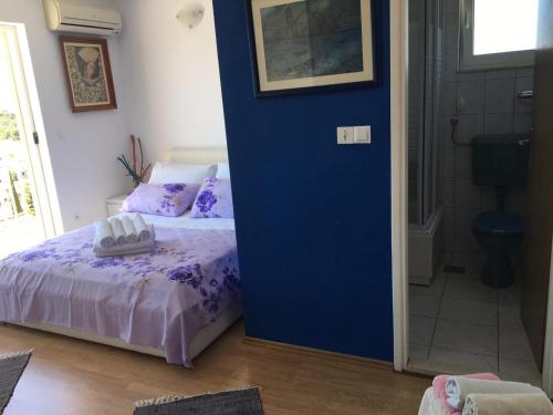 Postel nebo postele na pokoji v ubytování B&B Buzolic