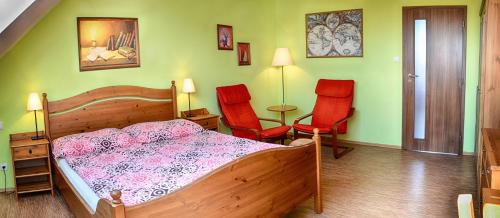 Ένα ή περισσότερα κρεβάτια σε δωμάτιο στο Apartmány Vojta