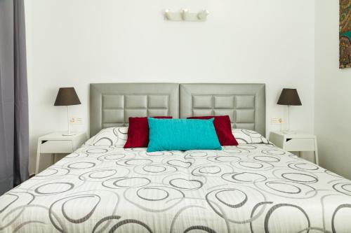 Postel nebo postele na pokoji v ubytování La Florida