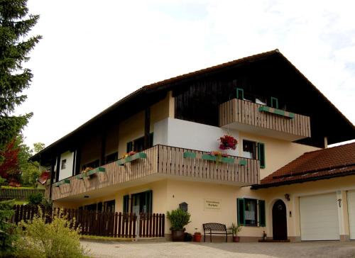 a building with balconies on the side of it at Ferienwohnung Marketa in Bayerisch Eisenstein