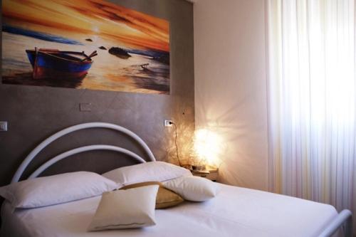 Кровать или кровати в номере Hotel Derby