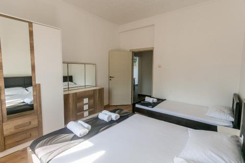 Katil atau katil-katil dalam bilik di Tramonto Apartments