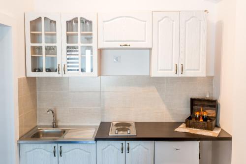 Dapur atau dapur kecil di Tramonto Apartments