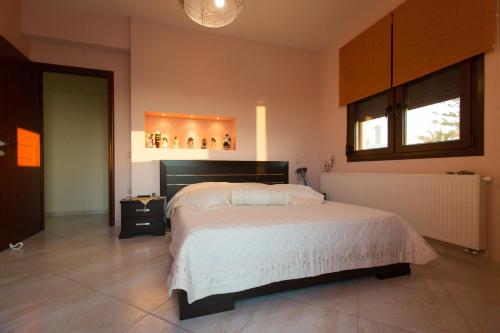 Posteľ alebo postele v izbe v ubytovaní Luxury Maisonette Afro