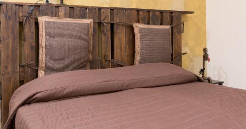 Säng eller sängar i ett rum på Sanremo Inn