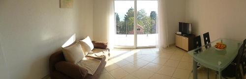 Et tv og/eller underholdning på Apartments Mauro