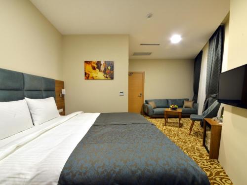 Sertaç Hotelにあるベッド