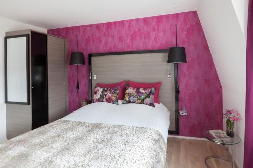 Postel nebo postele na pokoji v ubytování Andersen Boutique Hotel